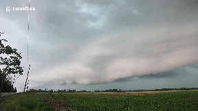 Lightning strikes as ominous shelf cloud looms over Ontario, Canada ...